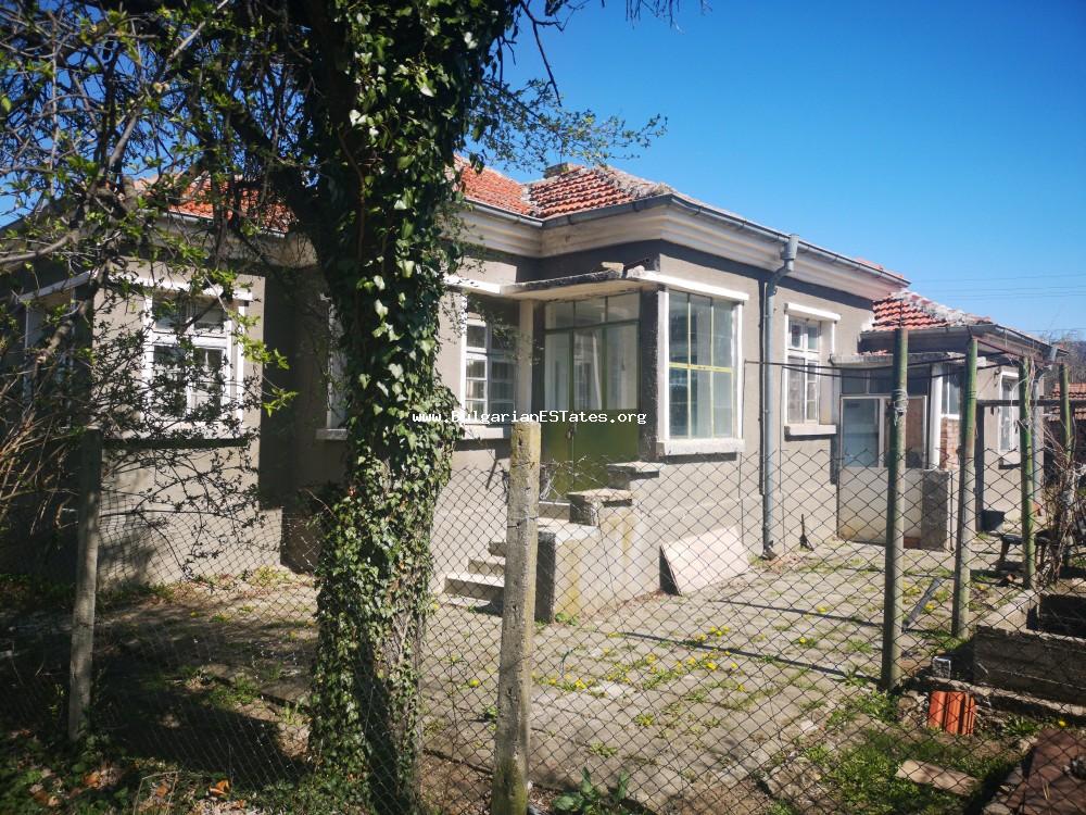 Charming detached house is for sale in the village of Lozarevo, 70 km from the city of Burgas, 20 km from the Kamchia dam with a spectacular view of the Balkan Mountains.