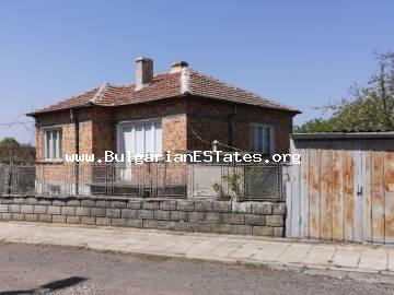 A large two-storey house is for sale in the center of the village of Bata, just 20 km from the sea.