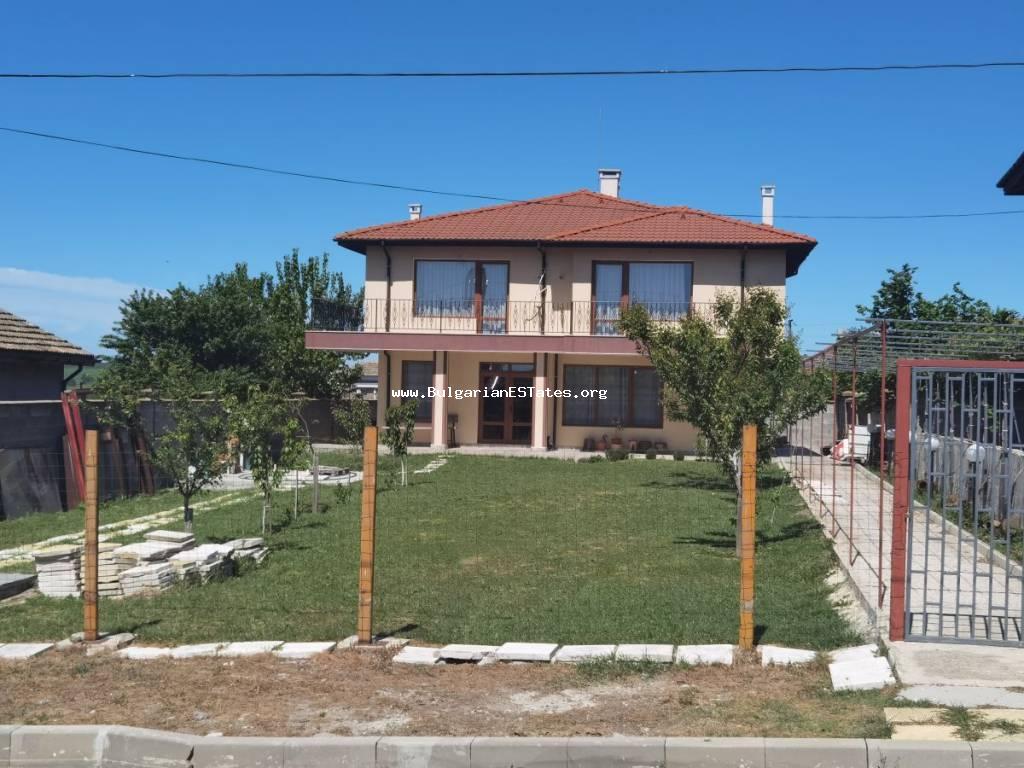 Beautiful family two-story house with a courtyard and a pleasant view is for sale in the village of Veselie, just 15 from the sea.
