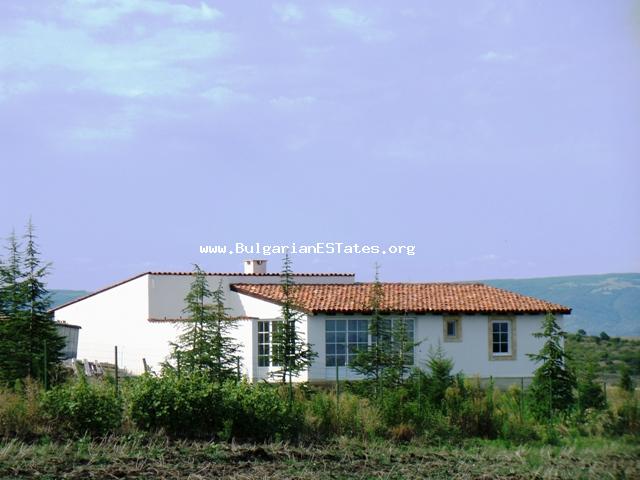 House located above the village of Alexandrovo,