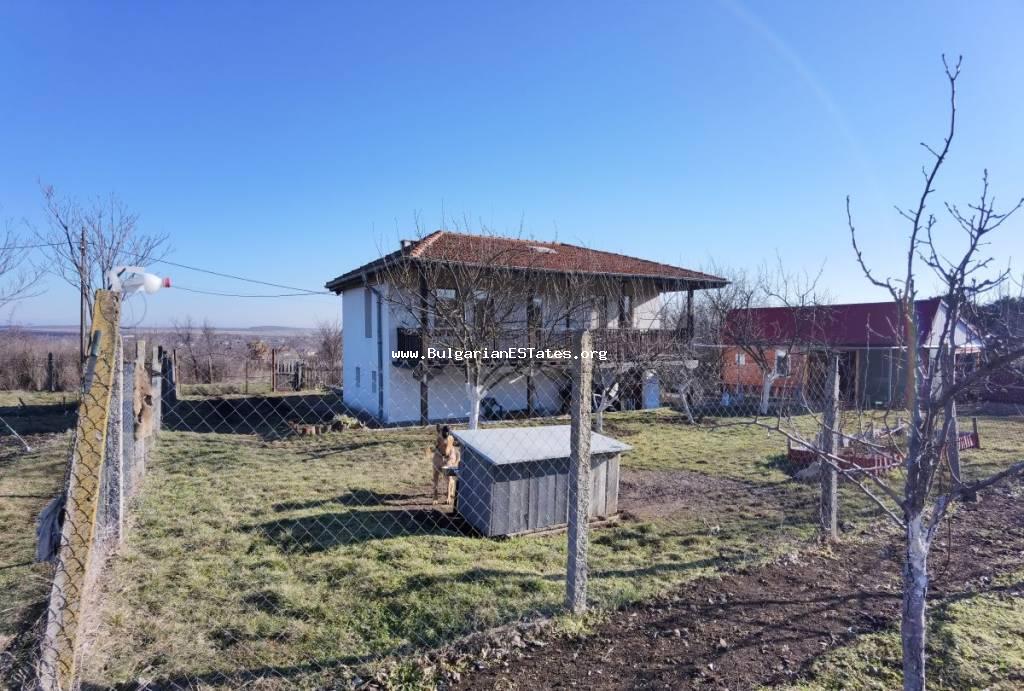 Buy a renovated two-storey house with a large courtyard and a beautiful view situated at the end of the village of Zornitsa, just 50 km from the city of Burgas and the sea. Bulgarian property.