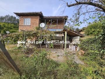 For sale is a massive two-storey house in the Strandzha Mountains, the village of Kosti, only 22 km from the town of Tsarevo and the sea, 40 km from the checkpoint with the Republic of Turkey, and 85 km from the town of Tsarevo, Burgas, Bulgaria.