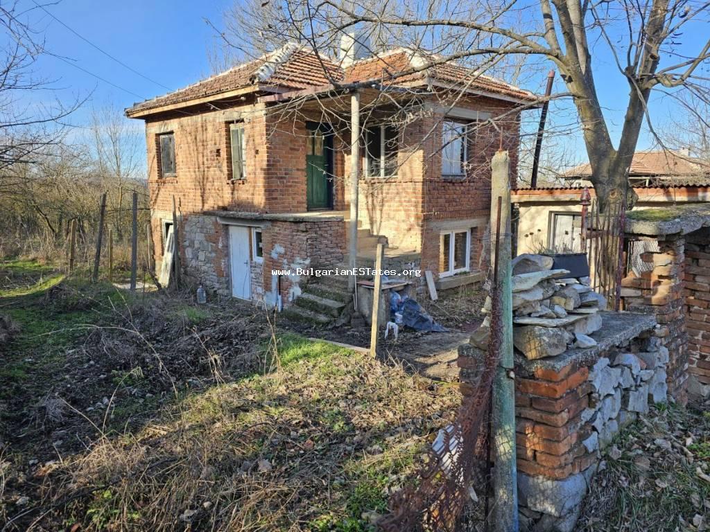 For sale is a two-storey house with a large yard in the village of Voinika, only 52 km from the city of Burgas and the sea, 27 km from the town of Sredets and 30 km from the town of Yambol, Bulgaria! Affordable house 50 km from the sea, Bulgaria!